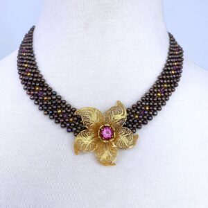 Woven Black Pearl Necklace with Pink Topaz & Golden Floral Centerpiece