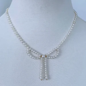 Pearl & Solid 14k Yellow Gold Accented Bow Necklace